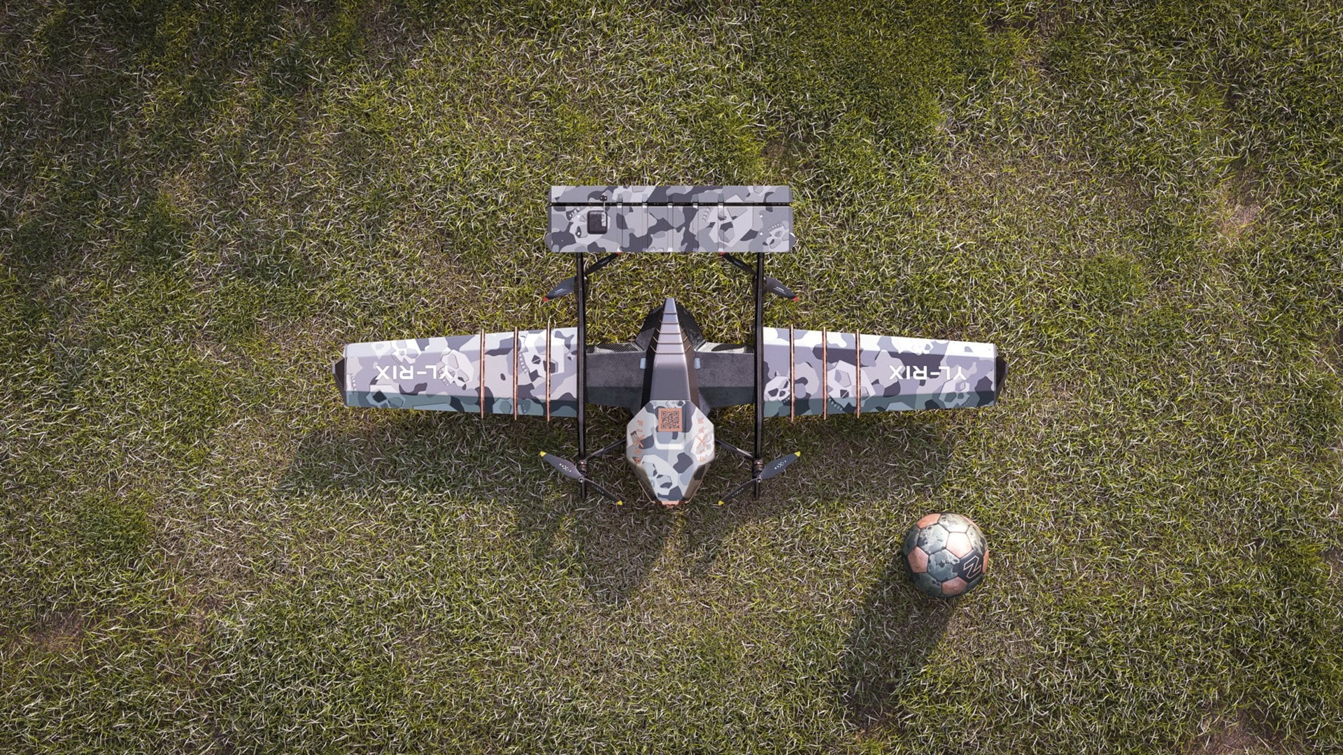DARTZ PromDrone Black Bee in camouflage livery on grass, seen from above