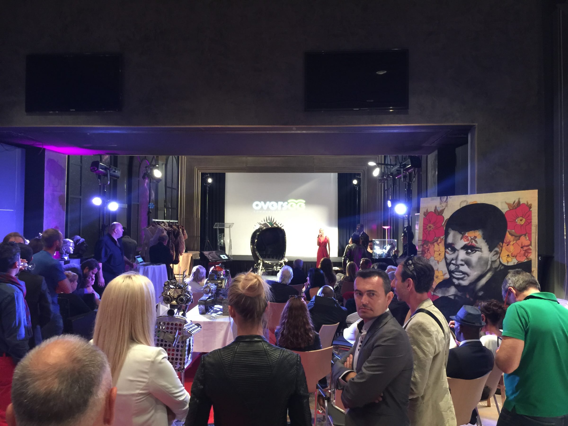 Guests filling the auction room at the Cannes Film Festival Auction 2015, Hôtel Barrière Le Majestic