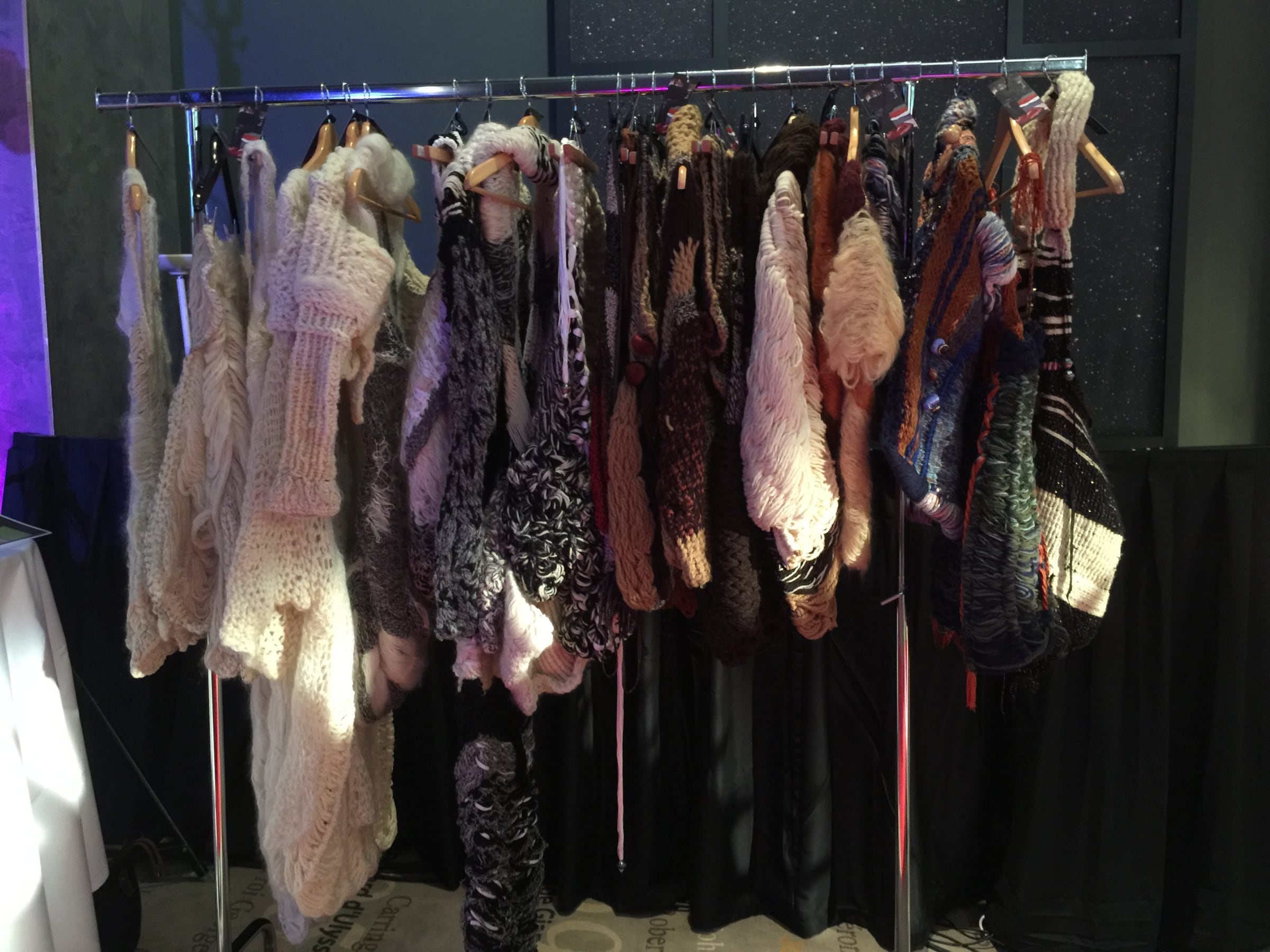 Rail of fur and knitted couture garments
