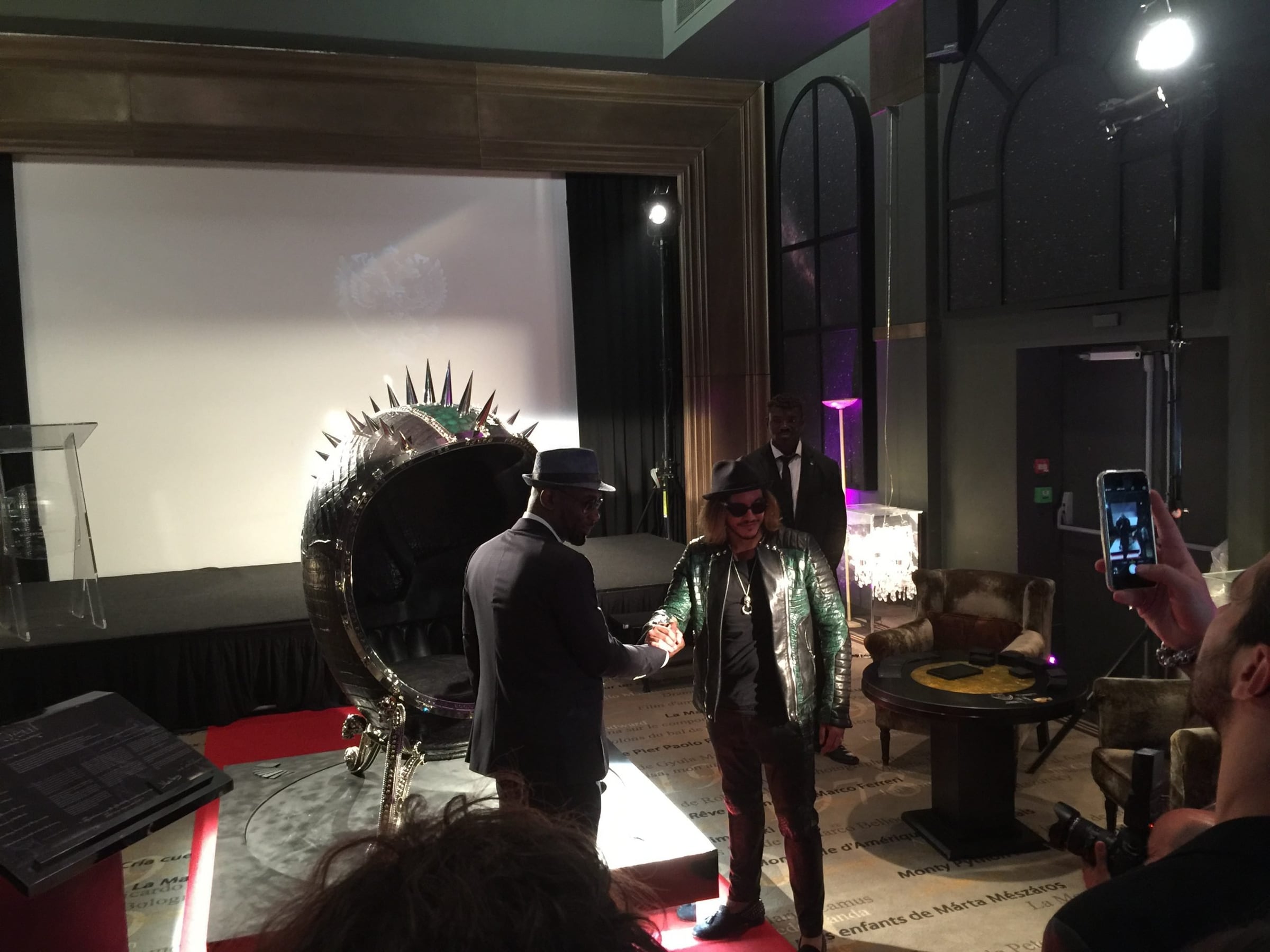 Spiked sculpture throne in front of the auction screen at the Cannes Film Festival Auction 2015, Hôtel Barrière Le Majestic