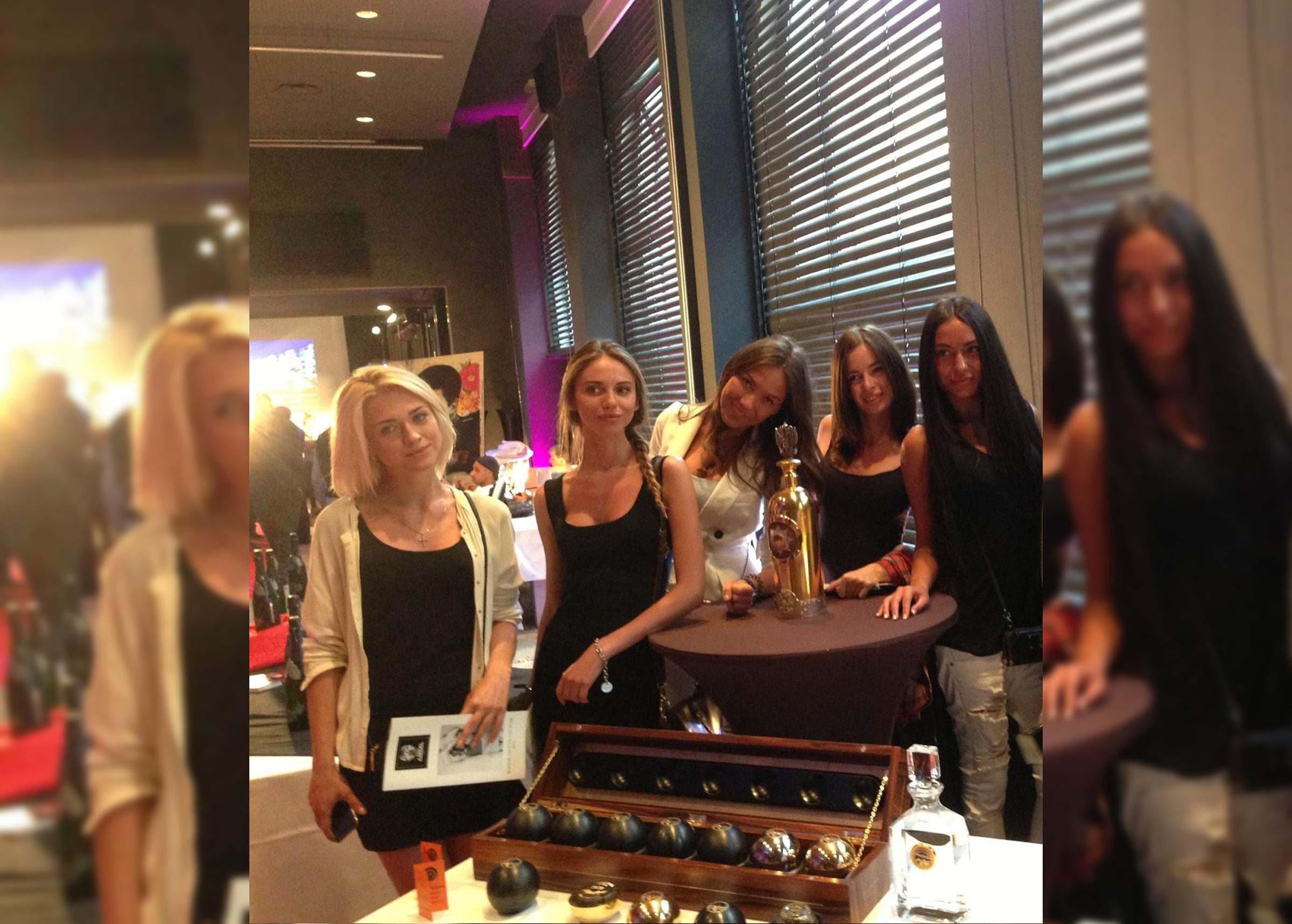 Guests with the gold DARTZ RussoBaltique vodka and the caviar case at the Cannes Film Festival Auction 2015, Hôtel Barrière Le Majestic