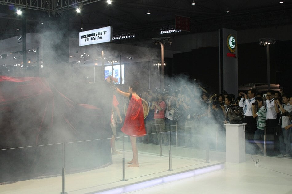 Stage smoke and red silk as the DARTZ Prombron’ is unveiled