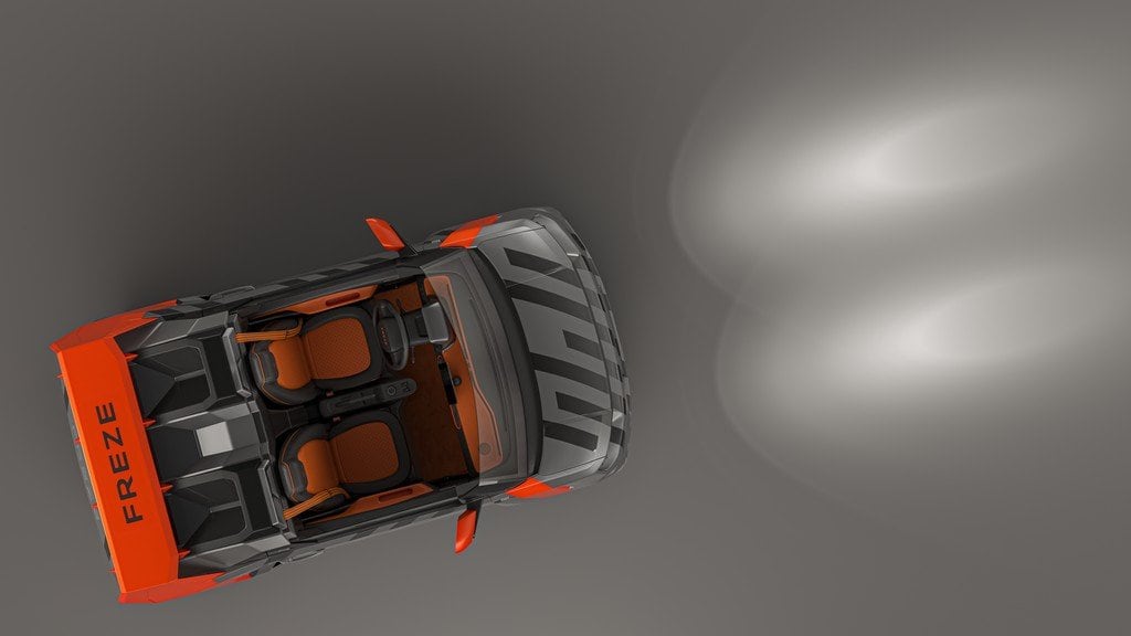 FreZe EV roadster seen from above, orange cabin open to the sky