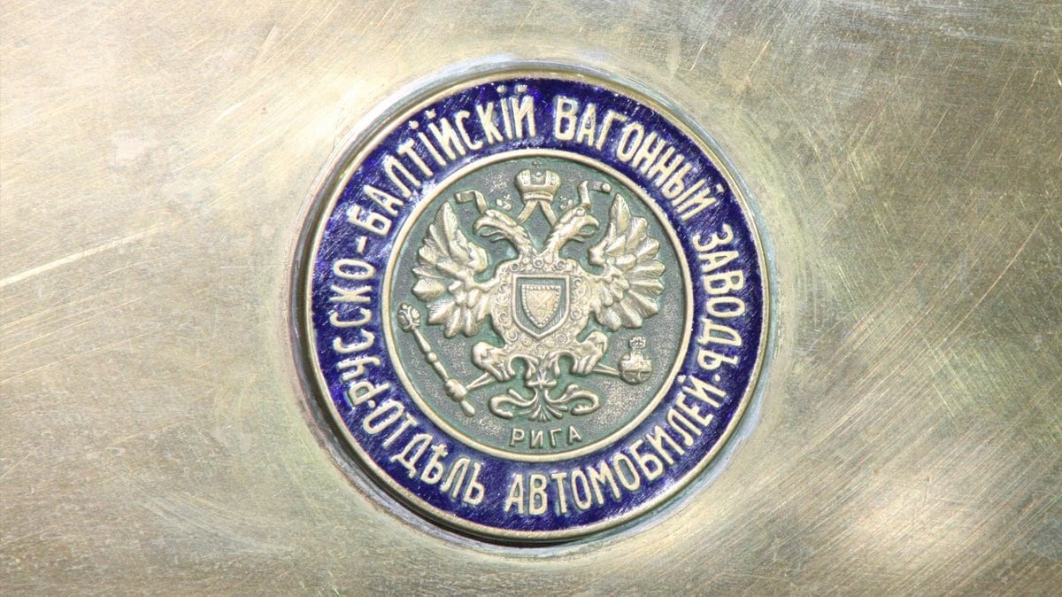 Enamel badge of the Russo-Baltic Wagon Works automobile department, with the double-headed eagle