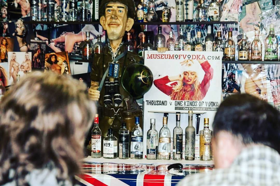 Vodka bottles and memorabilia behind the Museum of Vodka bar