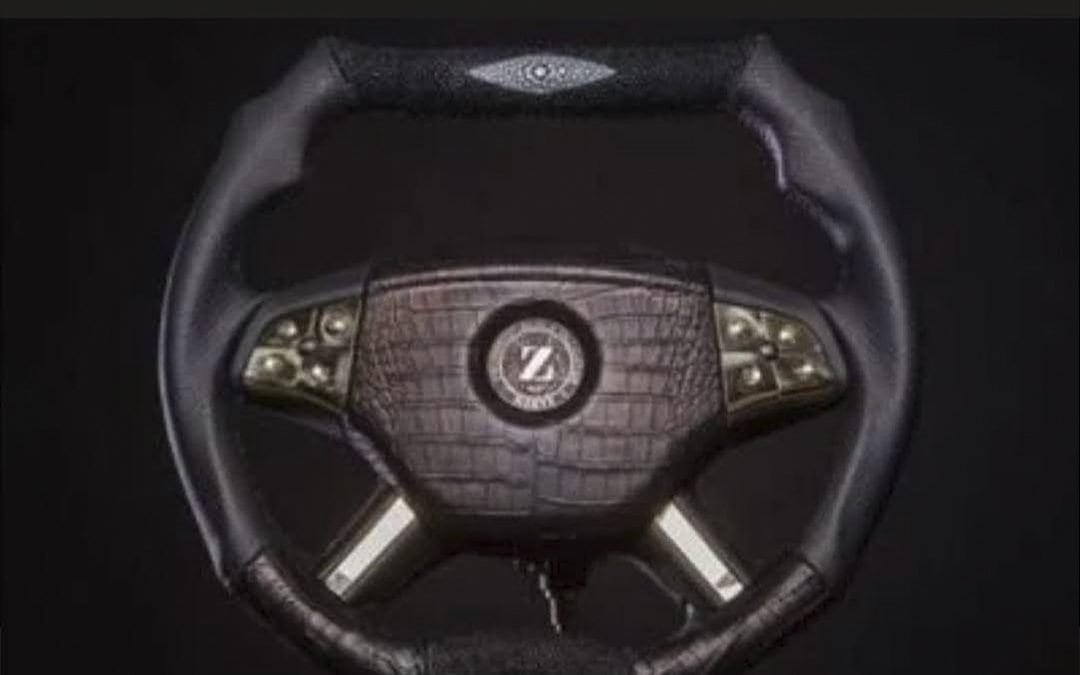 DARTZ steering wheel trimmed in crocodile leather